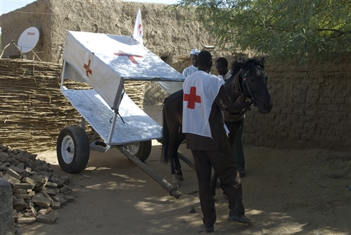 Adré. The Red Cross of Chad horse-drawn carriage ambulance, which  transports injured and sick persons from Adré and surroundings to district  hospital. - ICRC Audiovisual archives